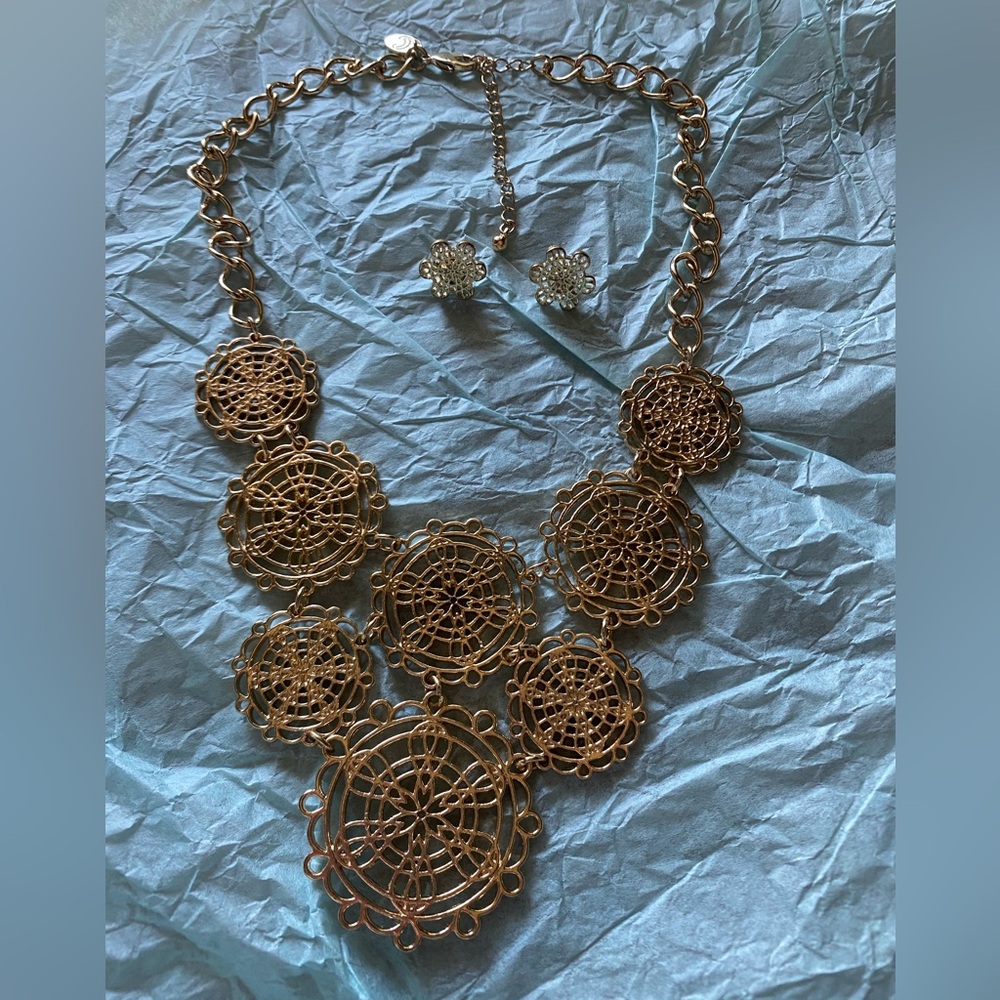 Gold Charming Charlie’s necklace and matching earrings
